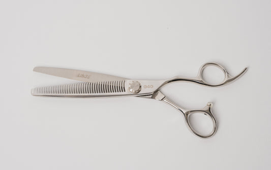 G4G Lite35 7-inch silver antler tooth thinning scissors made from Japanese 440C steel for dogs and cats.