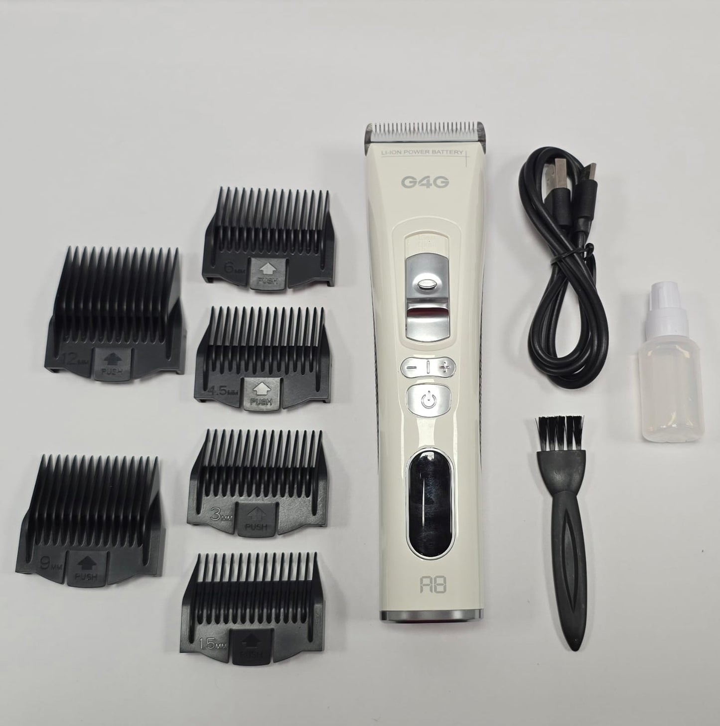 G4G 4-in-1 professional pet trimmer with digital display, adjustable blade, and comb attachments.
