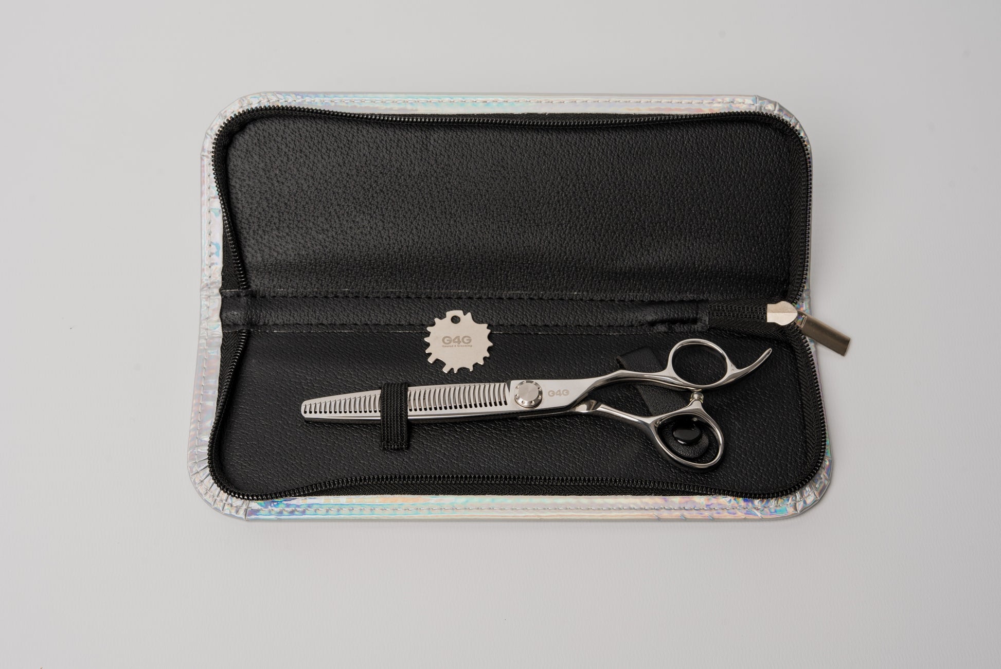 G4G Lite35 7-inch silver antler tooth thinning scissors made from Japanese 440C steel for dogs and cats.